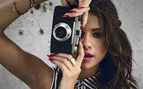 download wallpapers selena gomez american singer girl with camera photoshoot besthqwallpapers com selena gomez selena sarkicilar