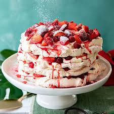 Cherry chocolate pavlova is a meringue dessert that's made of crispy on the outside and soft and fluffy as a cloud inside meringue disk, which is then topped with whipped cream and cherry sauce. Berry Pavlova Stack