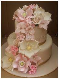 2 tier wedding cake £170. Hantaran206 A 2 Tier Fondant Hantaran Cake With White Background And Assorted Cascading Flowers For Orders Or Enquiries Plea Wedding Cakes Cake Creations Cake