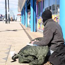Homeless man whose tent was set