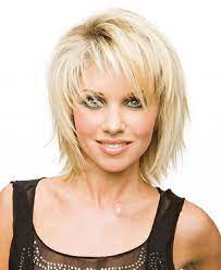 9 Funky Hairstyles For Medium Length Hair Uneven Layers And Fringes Medium Short Hair Short Hair Lengths Medium Layered Hair