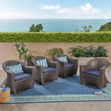 Throw it up with tons of pillows for a cozy and beautiful centerpiece in any room. Mackenzie Outdoor Swivel Wicker Chairs With Cushions Set Of 4 Multi Brown Navy Blue Walmart Com Walmart Com