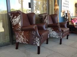 leather nguni hide wingback chairs from www hidesofafrica com cowhide furniture cowhide chair furniture