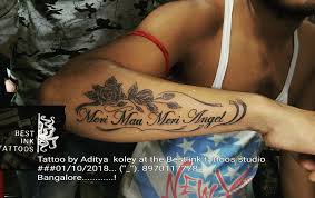 Flowers With Name Tattoo Hand Tattoo Artist Aditya Koley 21cross Cubbonpet Bangalore 8970117778 Hand Tattoos Tattoos Tattoo Artists