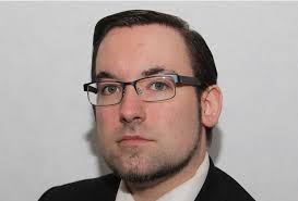 MHK defends Manx democracy