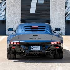 Image result for Concours Blue 2021 Aston Martin