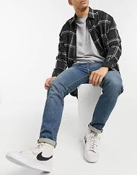Cut close to the body, the 511 slim is a great alternative to the skinny jean you'll get the same lean look. Levi S 511 Slim Fit Jeans In Eazy There It Is Mid Wash Asos
