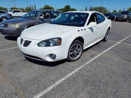 Image result for White 2004 Pontiac