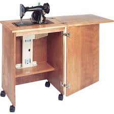 Impress your friends and family by making your own handcrafted sewing tables, sewing cabinets and sewing accessories with the help of our free sewing table plans, sewing cabinet plans and sewing center plans. Stu I Just Recently Finished Building A Big Sewing Machine Cabinet For The Wife At Her Request I Sewing Machine Cabinet Sewing Room Design Sewing Furniture