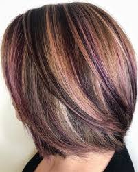When done right, the deeper hues of purple highlights pop through on the ends and in sporadic streaks, so as not to overpower the natural power of your dark base. Deep Purple And Blonde Hair