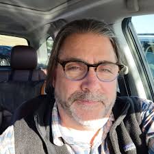 Identifying a person with long hair, possibly Weird Al