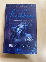 Gece mavisi bir alanın üstünde bronz bir kartal. Kivilcim Yangin Mavisi Serisi 1 Binnur Nigiz Nadir Kitap