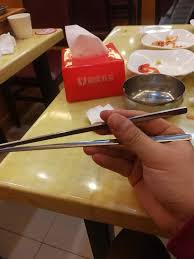 First, grab both chopsticks with one hand. Do Most Of The Chinese Hold Chopsticks Correctly I See Many Chinese Hold Chopsticks With Different Ways Quora
