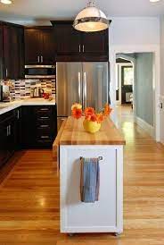 Bring in more light with a reflective countertop surface. Before After Small Kitchen Renovation Kitchen Design Small Small Kitchen Renovations Budget Kitchen Remodel