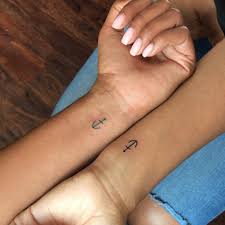 The cosmic pair, the sun and the moon, is an excellent tattoo idea. Tiny Best Friend Tattoos Popsugar Love Uk
