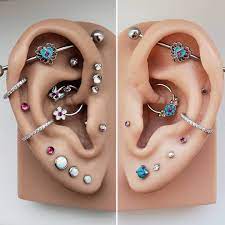 Left Or Right Which Look Do You Love More Let Us Know In The Comments Beautymarkbodyjewelry Different Ear Piercings Earings Piercings Ear Piercings Chart
