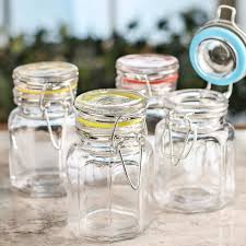 The transparent glass makes it easy to view the contents. Small Clamp Lid Glass Jar Jars Lids And Pumps Primitive Decor Factory Direct Craft