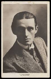 K. Scott-Barrie in character as "The entertainer". Photographic postcard,  ca. 1910.