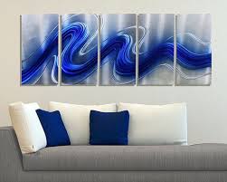 Find wood and metal wall decor for every color scheme and style, whether you're searching for a clock that doubles as art or a mirror to visually expand a room. Blue And Gray Metal Wall Art Novocom Top