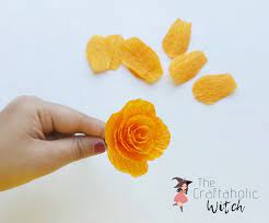 Use purple pen to add color to center os petals and around the green petals. Crepe Paper Roses Diy Crepe Paper Flowers 8 Easy Steps