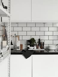Subway 3d wall panels, mono white with gray grout Josefin Haag S Apartment White Subway Tiles With Black Grout Kitchen Inspirations Kitchen Interior Kitchen Design