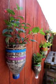 Remember to choose plastic bottles that are fairly thick and durable, such as soft drink bottles, rather than thin water bottles, which may tear under the weight of soil, plants and water. 13 Best Diy Recycled Plastic Bottle Wall Hanging Garden Ideas Bottle Garden Diy Plastic Bottle Diy Recycle Plastic