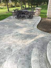 Beautiful Stamped Concrete Patio With Marbled Coloring By Ground Works Land Design In Westlake Oh Concrete Stain Patio Concrete Patio Designs Concrete Patio