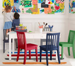 Made of metal and wood, the table was designed for style and durability. Carolina Craft Kids Play Table Pottery Barn Kids