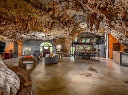This Luxury Cave House Is Built Into A Mountain And You Can Rent It For Your Next Vacation Photos Underground Homes Cave House Modern Residential Architecture