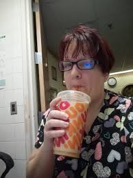 Coffee after work. Sorry for the bad hairdo. Ac in my son's truck isn't  working and it's 90° at a little after 8pm! In case yall can't read the  label
