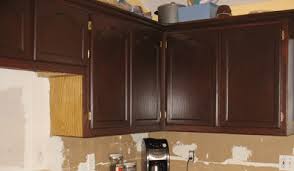 I Have Always Hated Our Golden Oak Cabinets And Once We Decided That We Were Giving Ourselves Staining Oak Cabinets Staining Cabinets Stained Kitchen Cabinets