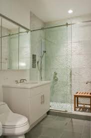 Plus, the continuation of the tile floor without a shower lip helps a lot. Small Bathroom Designs With Glass Shower Novocom Top