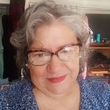 My mom Connie aka Chelo after making her 1st holy communion at Immaculate  Heart Church. They lived at 118 S. 8th St just south of Jefferson. They  were a family of 5,