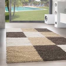Hochflor langflor teppich shaggy nova braun rund in 7 größen ist heute eines der meistverkauften produkt im vergleich zu anderen modellen und marken verglichen. Hochflor Langflor Wohnzimmer Shaggy Teppich Kariert Braun Weiss Beige Grosse 60x110 Cm