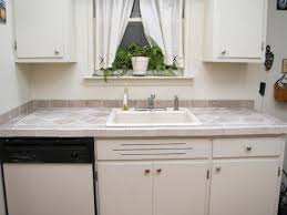 Learn how to tile your kitchen countertop. Installing A Tile Countertop Hgtv