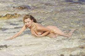 Nude Babe In The Warm Sea. Stock Photo, Picture and Royalty Free Image.  Image 17354637.