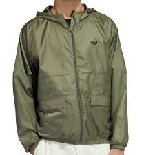 Available in performance or style at the official online store. Adidas Jacke Light Windbreaker Grun Curious Shop