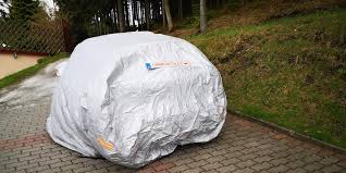 Audew car cover / protective hood in rapid test