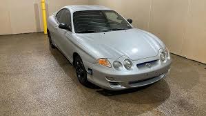 Image result for Bright Silver 2000 Tiburon