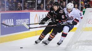 Above, prokop, #6 of the calgary hitmen, passes the puck against the kelowna rockets at prospera place on february 17. Nl Ekc14fpnctm