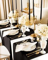 A black tie affair calls for candles and floral centrepieces rather than colourful balloons and streamers. New Year S Eve Dinner Gold Table Setting Wedding Table Settings Table Settings