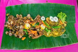A louisiana seafood boil includes an assortment of seafood such as lobsters, crabs, shrimps. Idrus Ikan Bakar Batu Uban Bayan Lepas Penang Crisp Of Life