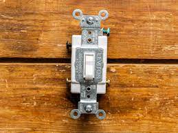 The one on the left. Understanding Three Way Wall Switches