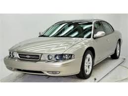 Image result for Bright Silver Quartz 1993 Chrysler