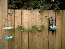 Diy Bird Bath And Feeder Diy Wall Mounted Bird Feeder And Bird Bath Offbeat Home Life Diy Bird Feeder Diy Bird Bath Bird Feeders