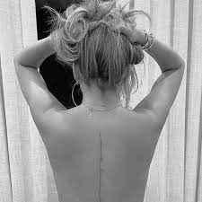 Jack passed away in october after teigen. Chrissy Teigen Gets Sexy Spine Tattoo Of John Legend S Lyric Popsugar Beauty