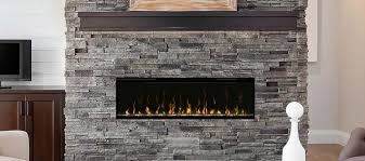 White paint gives this brick fireplace a charming, timeworn look. Dimplex Electric Fireplaces Schut S