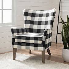 Black and white checkers on textured fabric background. Black And White Buffalo Check Wingback Chair Kirklands