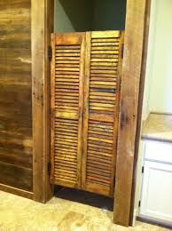 How Awesome Is This Swinging Door That One Of Our Customers Crystal Made With Shutters She Got From Us Swinging Doors Shutters Doors