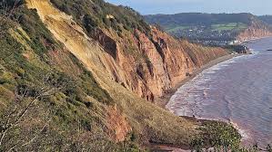Coastal path closed after cliff fall in east Devon - BBC News